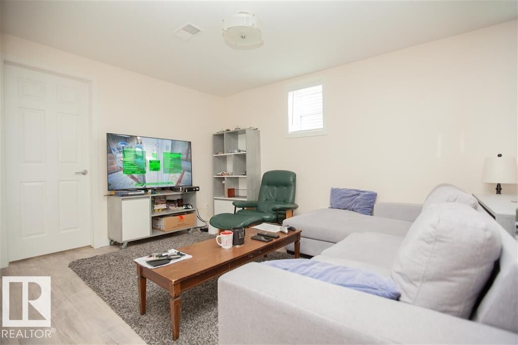 Property Photo:  11403 83 Street NW Bsmt  AB T5B 2Y4 