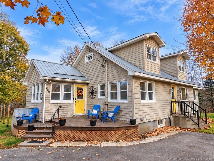 Property Photo: 209 Saunders Road NB E6J 1M3