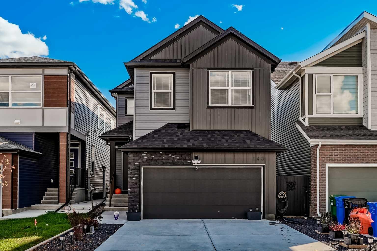 Property Photo:  143 Wolf Hollow Manor SE  AB T2X 5J8 