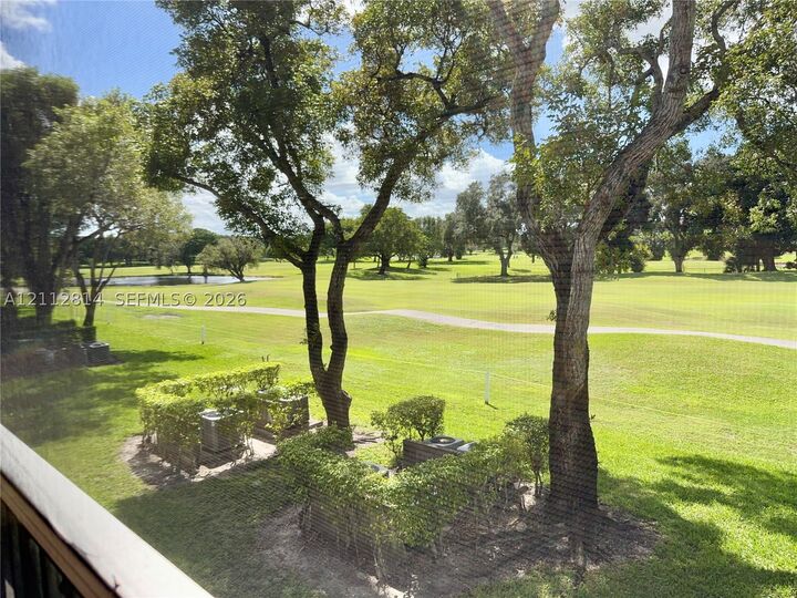 Property Photo:  400 SW 134th Way 210F  FL 33027 