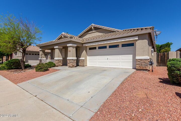 Property Photo: 17556 W Bloomfield Road AZ 85388