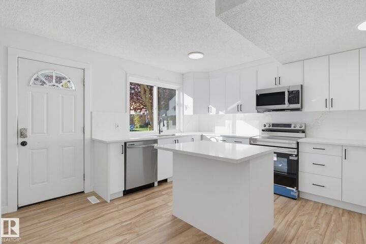 Property Photo: 133 Woodstock NW AB T5T 0H6