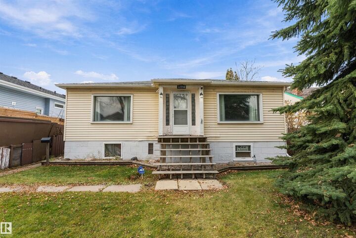 Property Photo:  12210 95 Street NW  AB T5G 1N2 