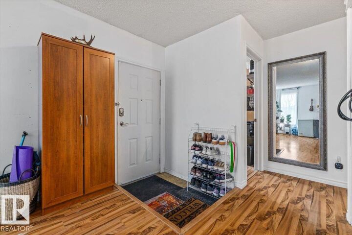 Property Photo:  11827 140 Avenue NW  AB T5X 4J7 
