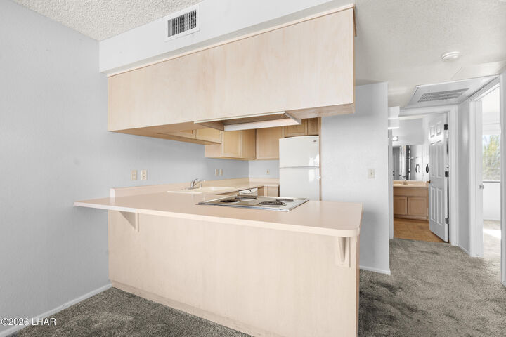 Property Photo: 1989 Mesquite Ave 92 AZ 86403