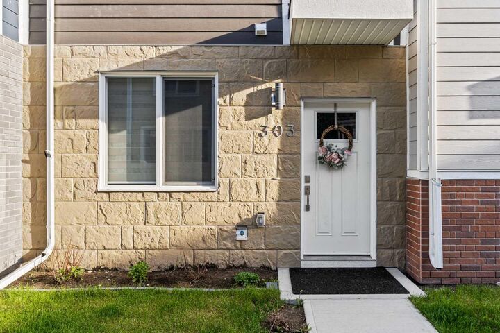 Property Photo:  11428 52 Street NE 303  AB T3N 1S2 