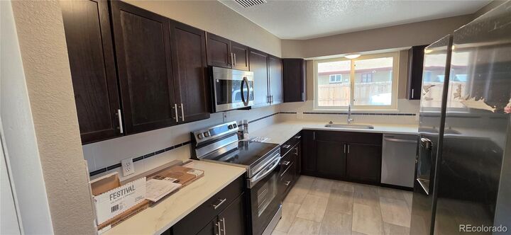 Property Photo:  6778 W 37th Place 6780  CO 80033 