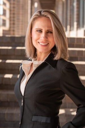 Thea Rotbasean,  in Colorado Springs, Kenney & Company