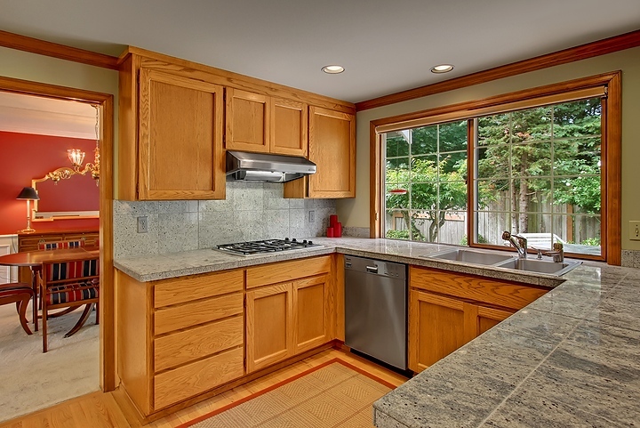 Property Photo: Oak/granite kitchen 15607 SE 45th Place  WA 98006 