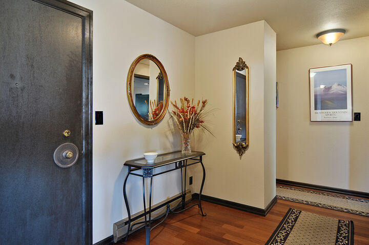 Property Photo: Foyer, living room, dining room, kitchen, eating area 750 Crockett St 401  WA 98109 